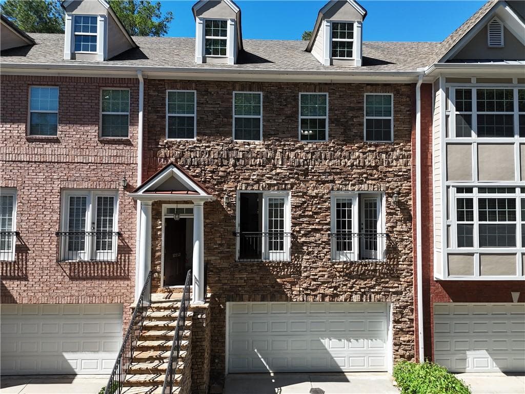 3 bedroom, 4 bathroom, 2,531 sq ft townhouse for sale at 10950 Brunson Drive, Johns Creek, GA 30097