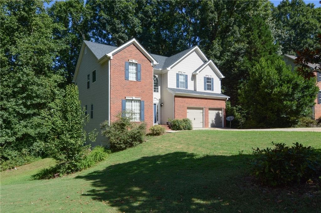 6 bedroom, 5 bathroom, 3,473 sq ft single family residence for sale at 2108 Brickton Crossing, Buford, GA 30518 — photo 2