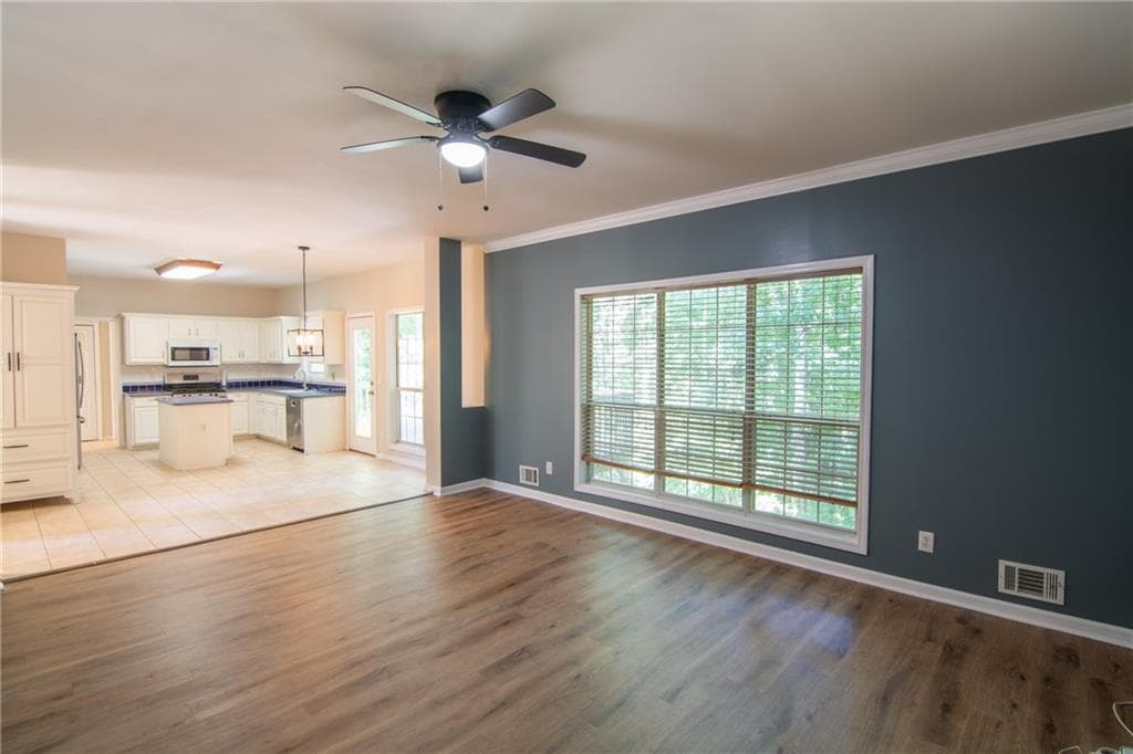 6 bedroom, 5 bathroom, 3,473 sq ft single family residence for sale at 2108 Brickton Crossing, Buford, GA 30518 — photo 7