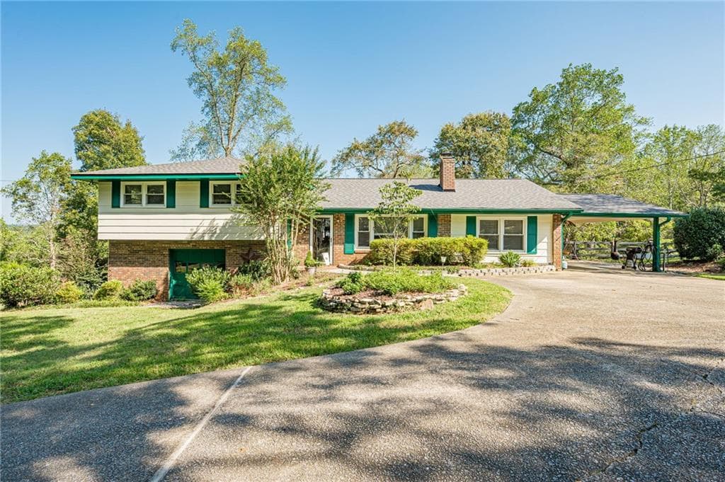 3 bedroom, 2 bathroom, 2,888 sq ft single family residence for sale at 1276 Howell Bridge Road, Ball Ground, GA 30107 — photo 2