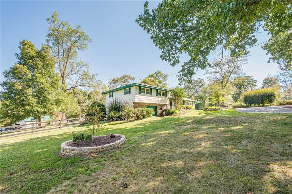 3 bedroom, 2 bathroom, 2,888 sq ft single family residence for sale at 1276 Howell Bridge Road, Ball Ground, GA 30107 — photo 3