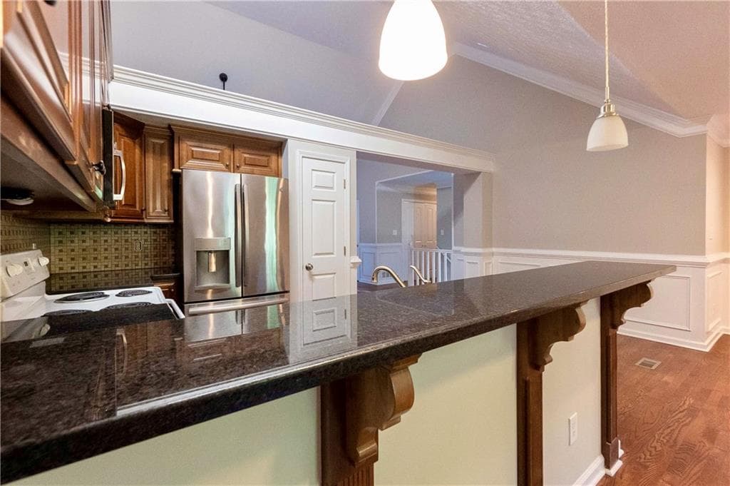 4 bedroom, 3 bathroom, 2,200 sq ft single family residence for sale at 5507 Riverside Drive, Sugar Hill, GA 30518 — photo 7