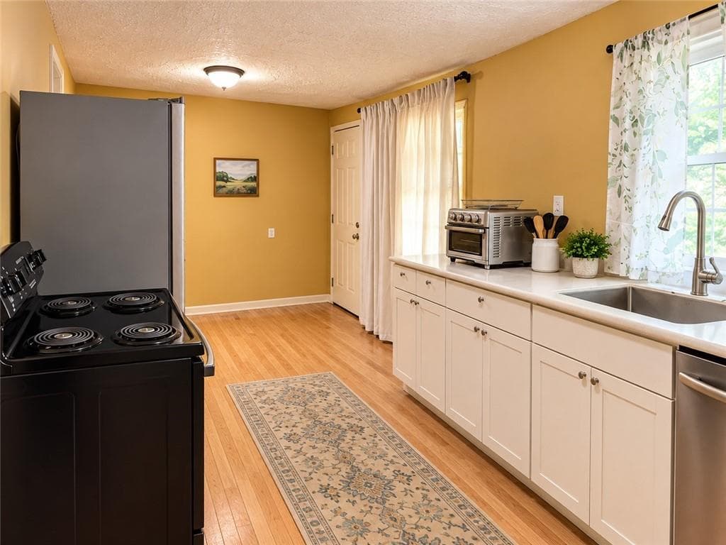 3 bedroom, 1 bathroom, 1,026 sq ft single family residence for sale at 602 McCurdy Road, Villa Rica, GA 30180 — photo 5