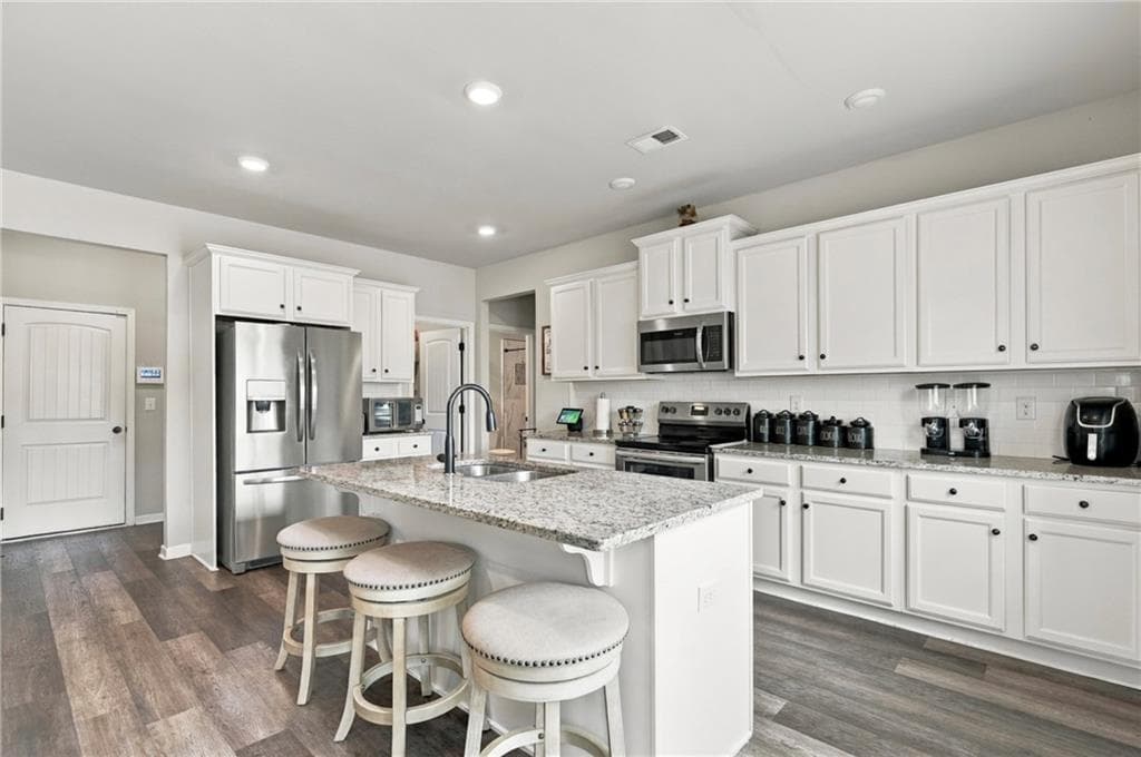 5 bedroom, 3 bathroom, 3,413 sq ft single family residence for sale at 1168 Gaines Street, Jonesboro, GA 30238 — photo 6