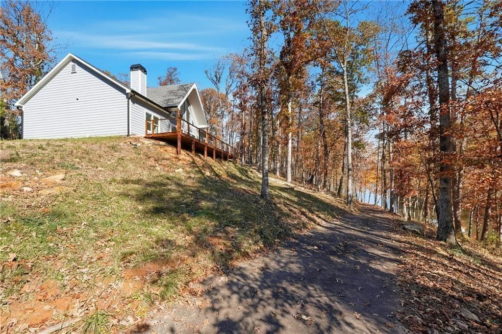 3 bedroom, 2 bathroom, 1,620 sq ft single family residence for sale at 8155 Stone Hill Road, Cumming, GA 30028 — photo 7