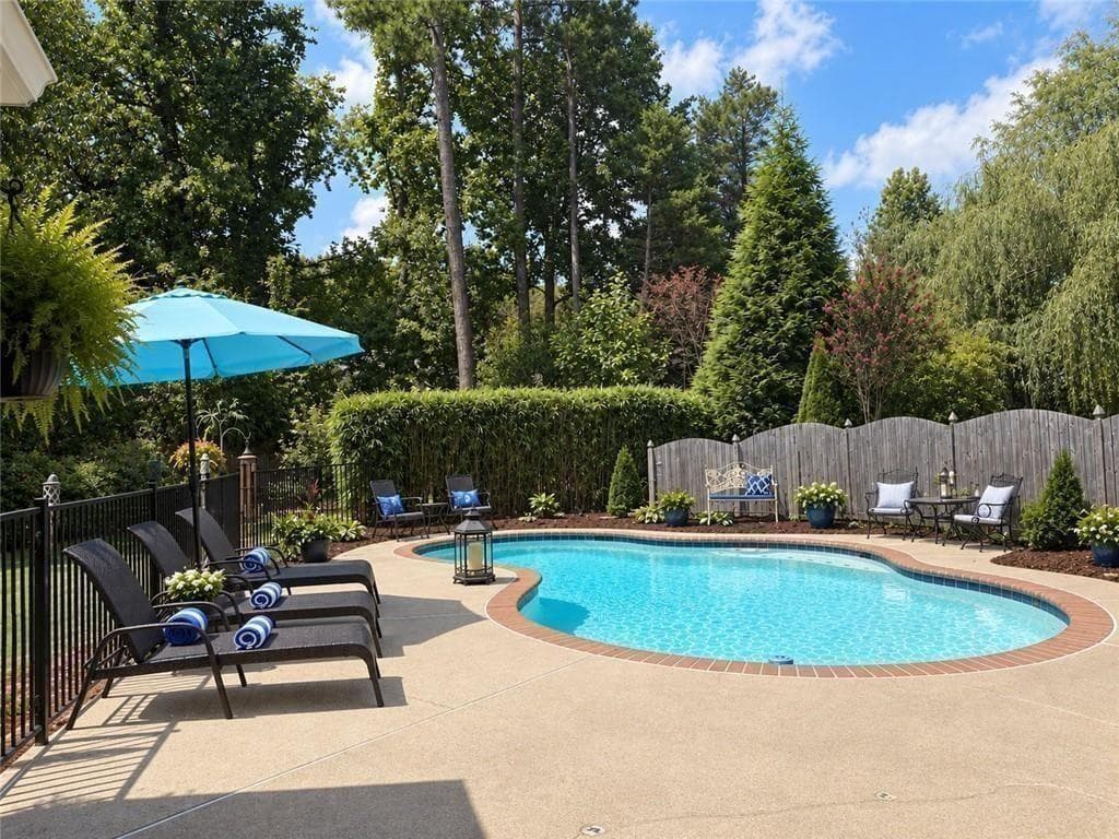 5 bedroom, 3 bathroom, 3,482 sq ft single family residence for sale at 5715 N Hillbrooke Trace, Johns Creek, GA 30005 — photo 5