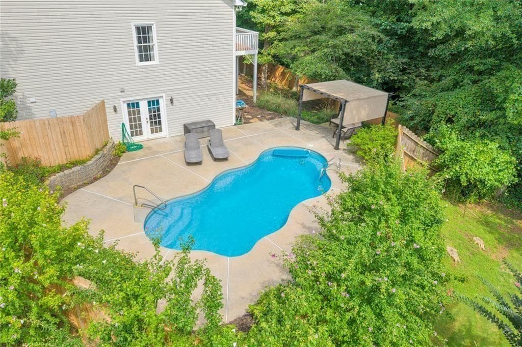 5 bedroom, 4 bathroom, 3,756 sq ft single family residence for sale at 214 Kingsley Way, Woodstock, GA 30188 — photo 3