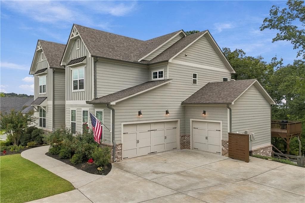 6 bedroom, 5 bathroom, 6,122 sq ft single family residence for sale at 427 Parkbrook Way, Canton, GA 30114 — photo 2