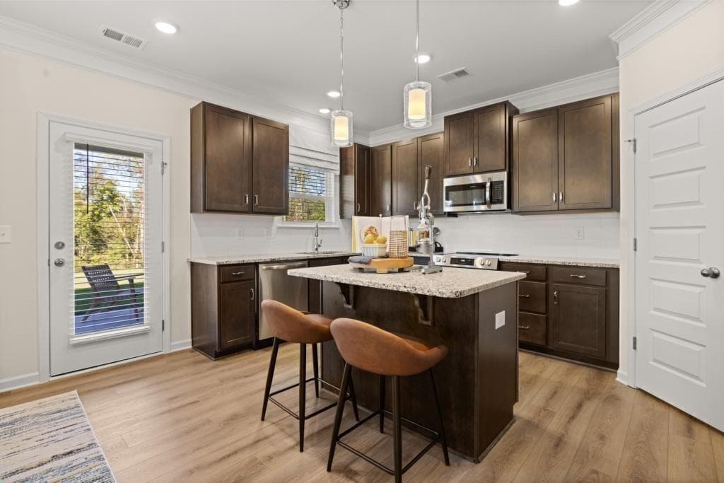 4 bedroom, 3 bathroom, 2,372 sq ft single family residence for sale at 480 Wick Street, Hoschton, GA 30548 — photo 3