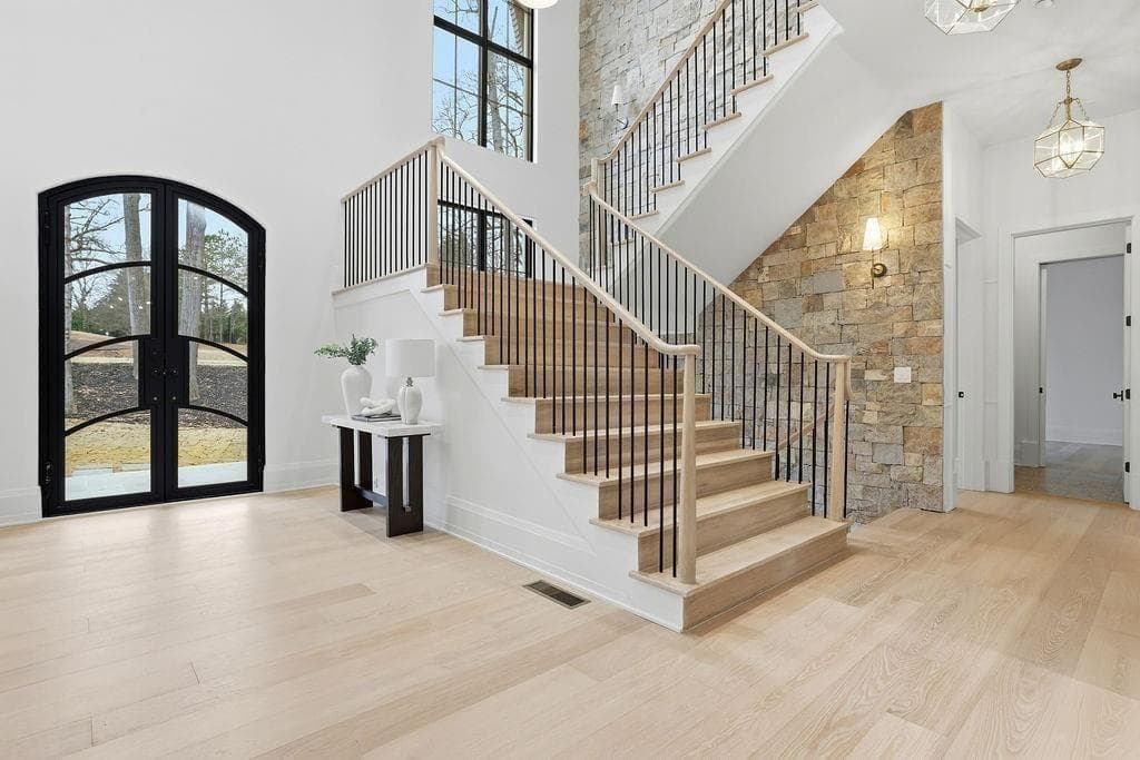5 bedroom, 6 bathroom, 7,441 sq ft single family residence for sale at 115 Oak Leaf Trail, Milton, GA 30004 — photo 2