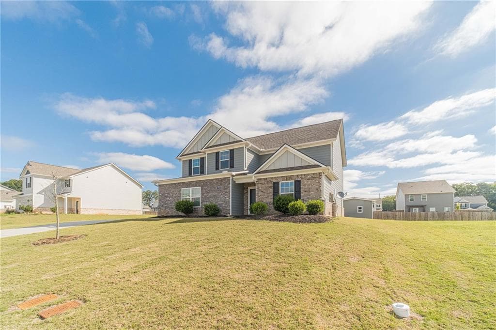 4 bedroom, 3 bathroom, 2,249 sq ft single family residence for sale at 722 Woody Drive, Monroe, GA 30655 — photo 2