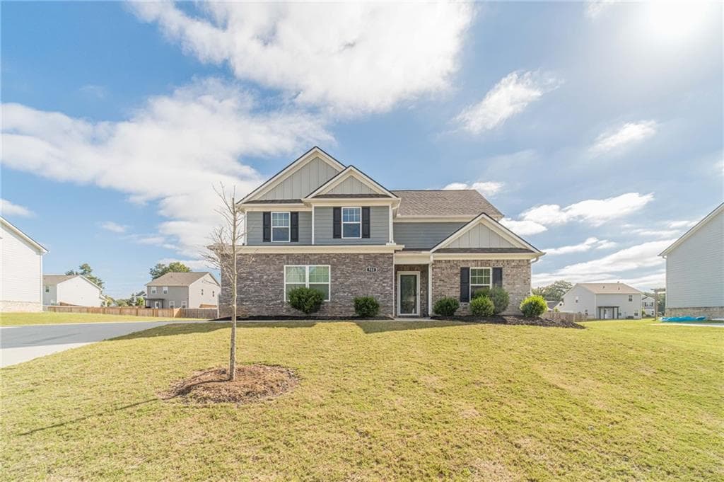 4 bedroom, 3 bathroom, 2,249 sq ft single family residence for sale at 722 Woody Drive, Monroe, GA 30655