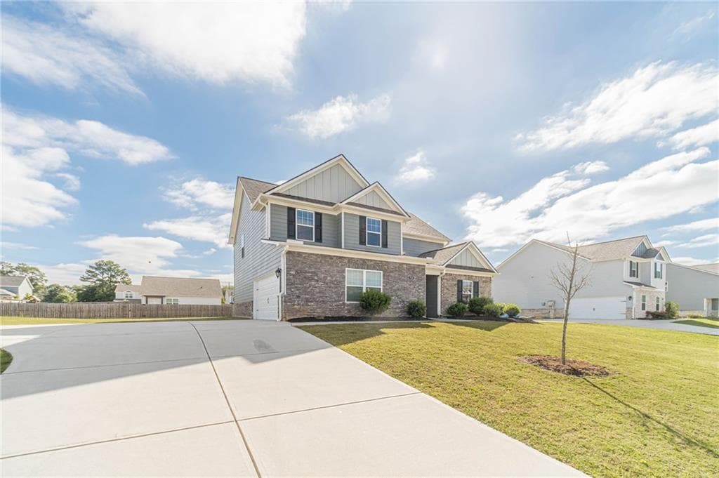 4 bedroom, 3 bathroom, 2,249 sq ft single family residence for sale at 722 Woody Drive, Monroe, GA 30655 — photo 4