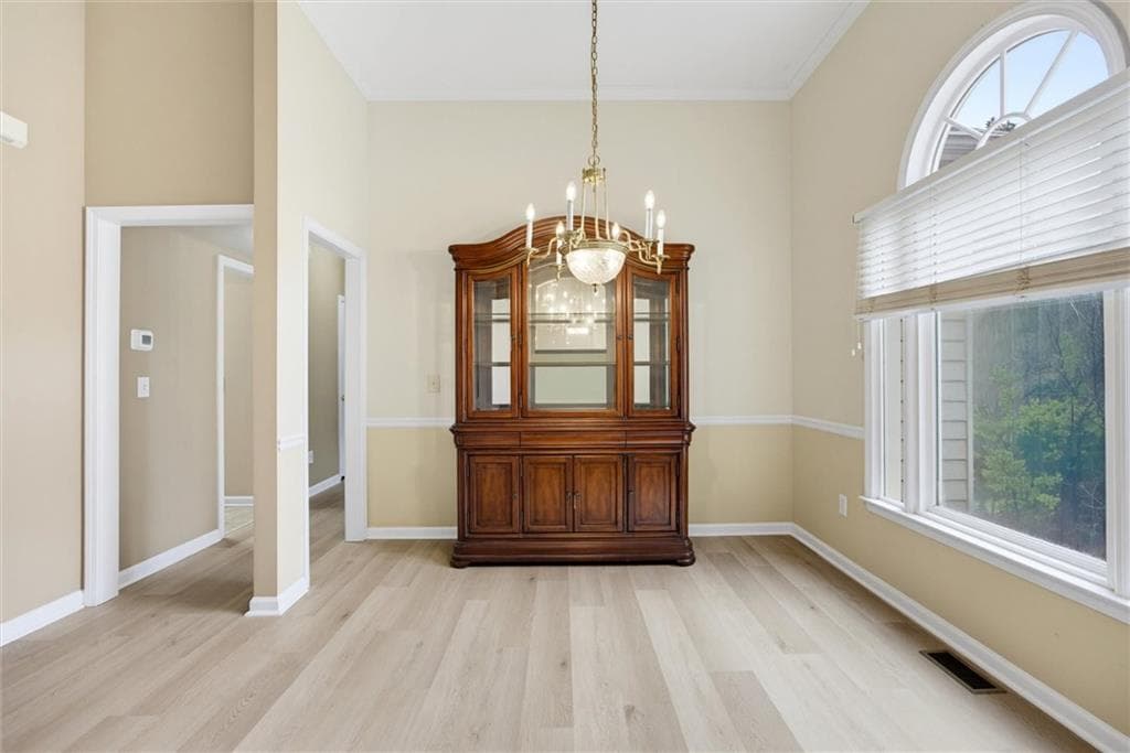 4 bedroom, 4 bathroom, 2,822 sq ft single family residence for sale at 4090 Chestnut Springs Court, Cumming, GA 30041 — photo 4