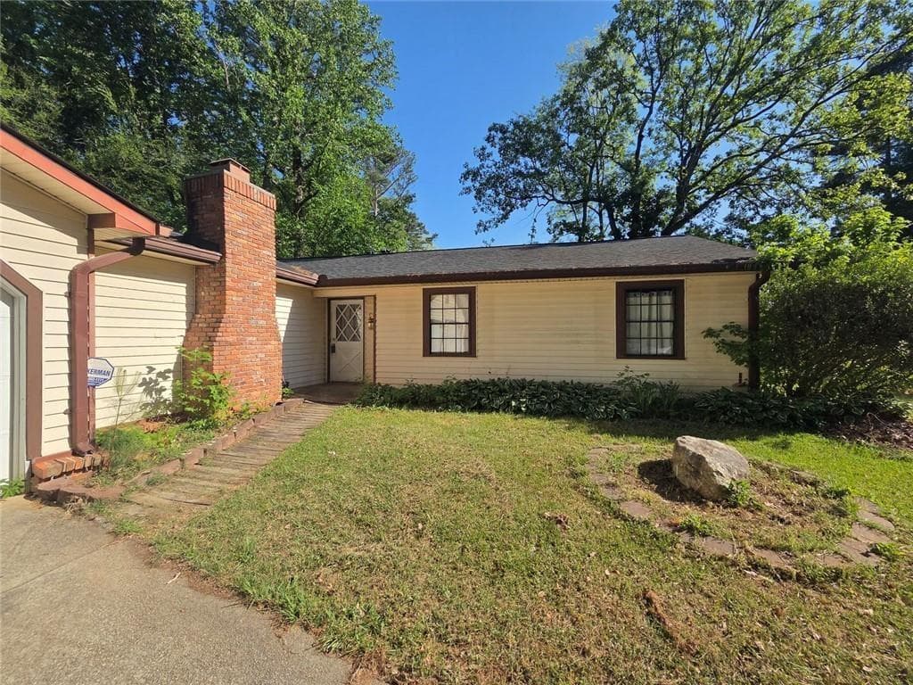 3 bedroom, 2 bathroom, 2,807 sq ft single family residence for sale at 1045 Millard Road, Stone Mountain, GA 30088 — photo 2