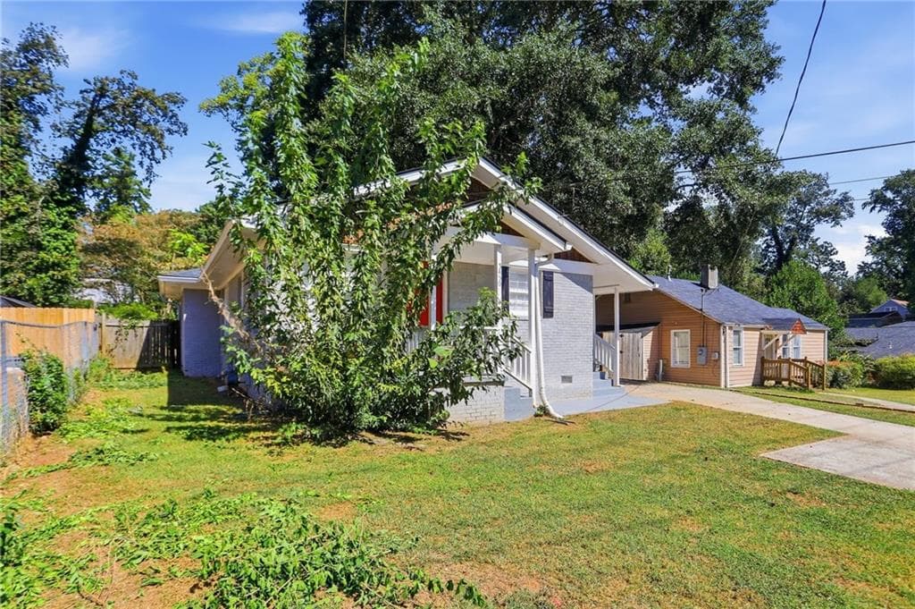 3 bedroom, 2 bathroom, 1,123 sq ft single family residence for sale at 3450 Glenwood Road, Decatur, GA 30032 — photo 2