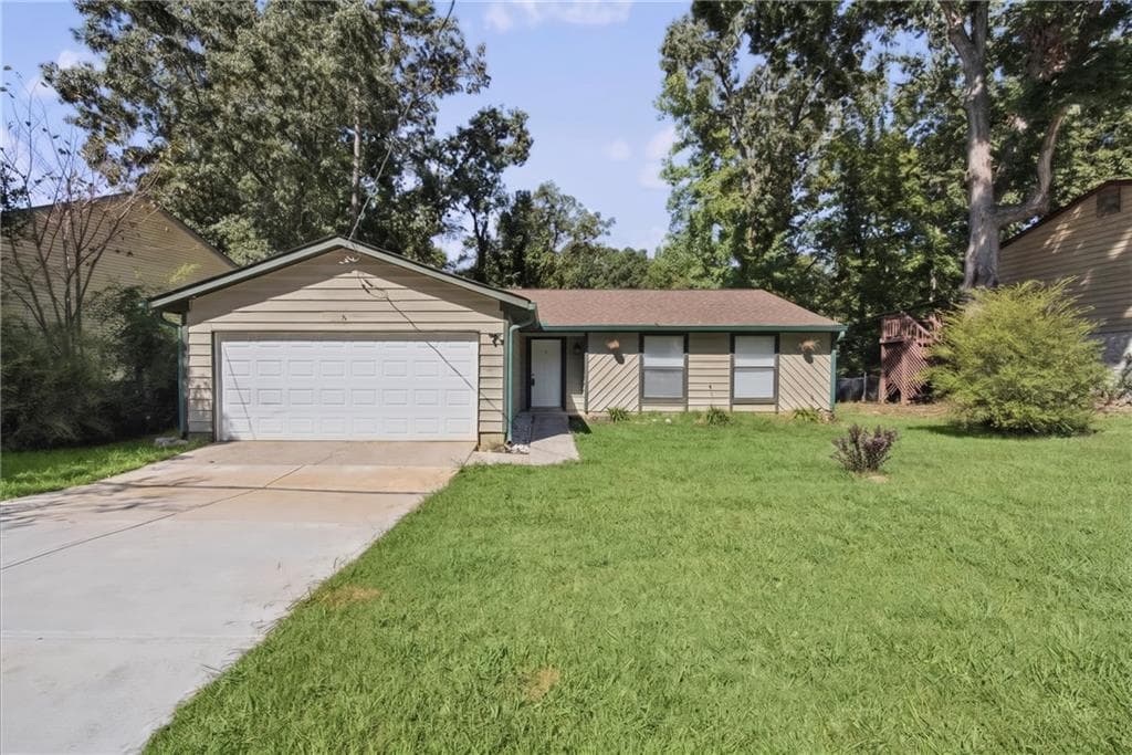 3 bedroom, 2 bathroom, 1,490 sq ft single family residence for sale at 1321 Muirforest Drive, Stone Mountain, GA 30088 — photo 8
