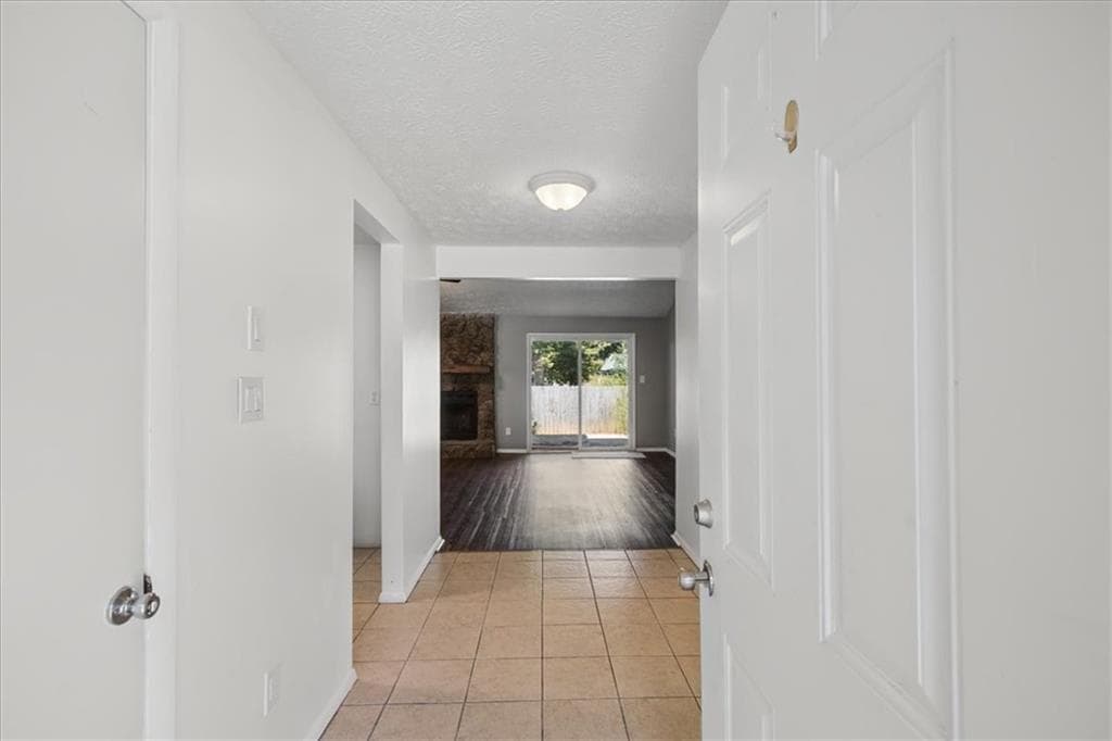 3 bedroom, 2 bathroom, 1,490 sq ft single family residence for sale at 1321 Muirforest Drive, Stone Mountain, GA 30088 — photo 9
