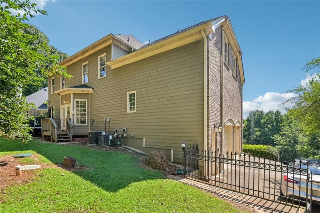 5 bedroom, 4 bathroom, 4,800 sq ft single family residence for sale at 3230 Sweetwater Drive, Cumming, GA 30041 — photo 9