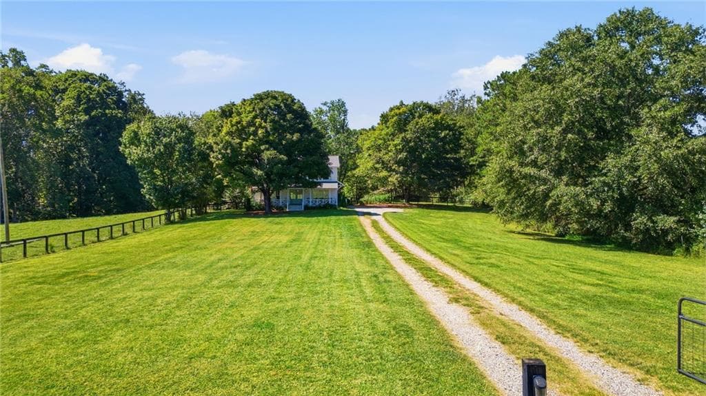 4 bedroom, 3 bathroom, 2,442 sq ft home for sale at 5425 Howard Road, Cumming, GA