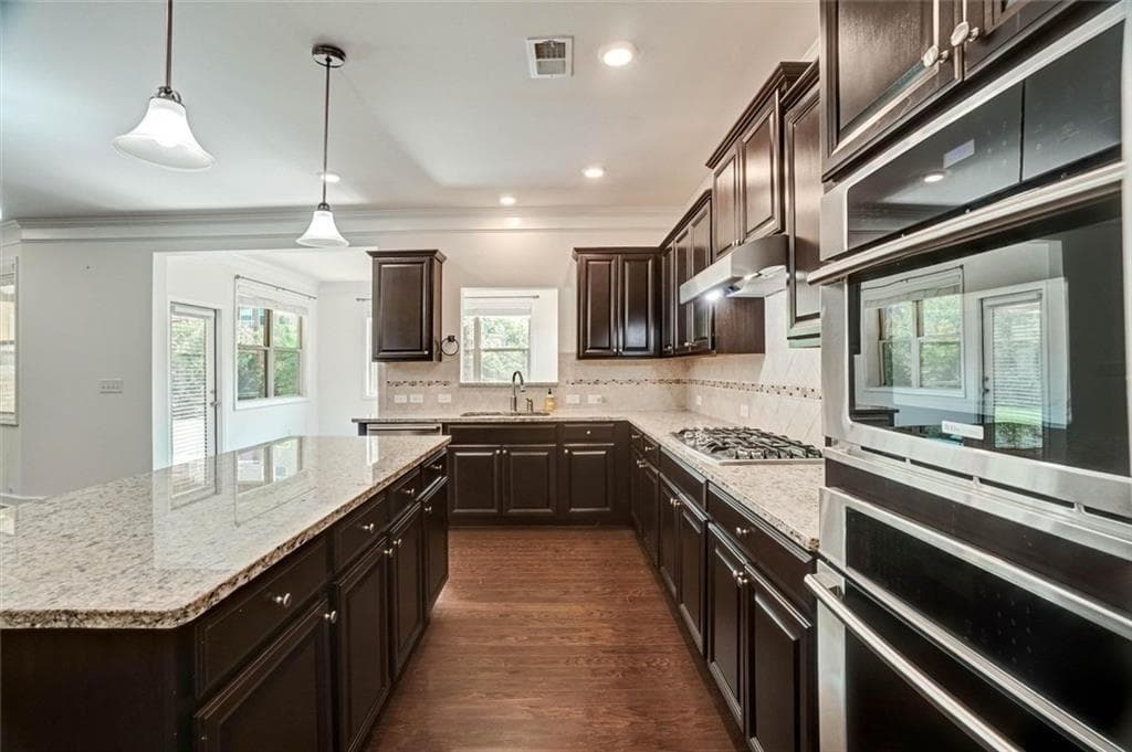 5 bedroom, 4 bathroom, 4,357 sq ft single family residence for sale at 1820 Stonington Drive, Cumming, GA 30041 — photo 6