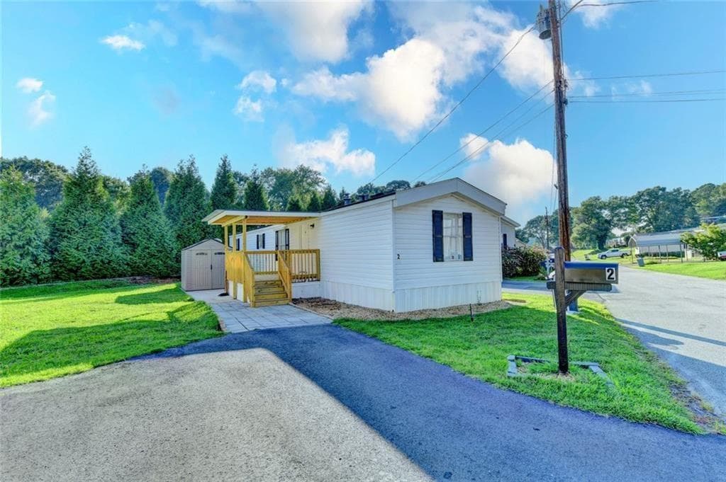 2 bedroom, 2 bathroom, 1,008 sq ft single family residence for sale at 3000 Clarks Bridge Lot 2 Road, Gainesville, GA 30501 — photo 2