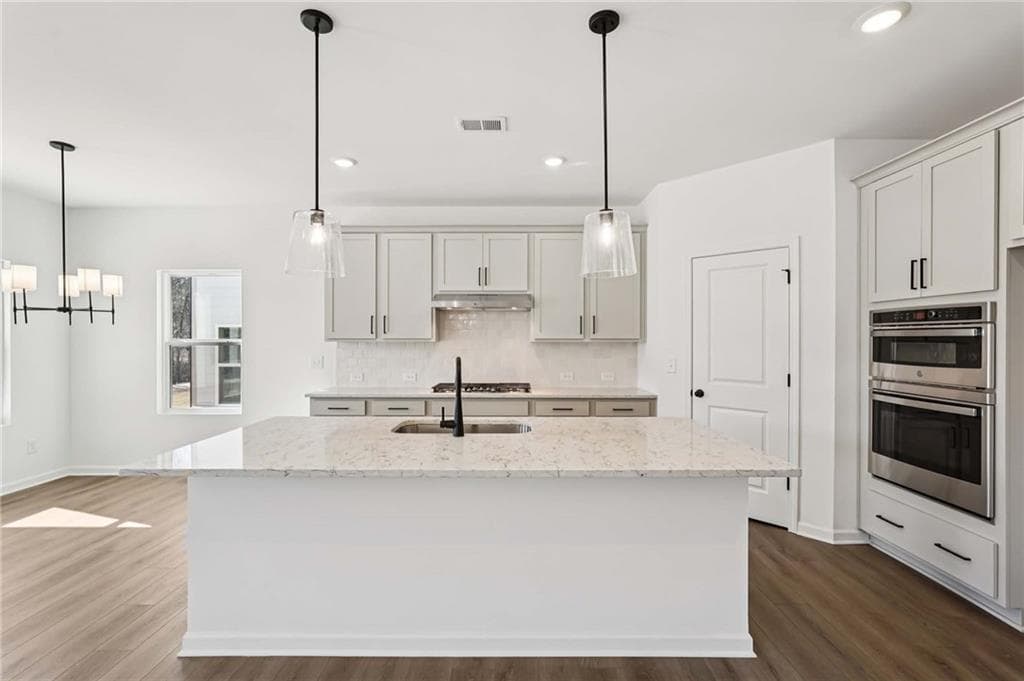 5 bedroom, 4 bathroom, 2,859 sq ft single family residence for sale at 6264 Kismet Road, Buford, GA 30518 — photo 10