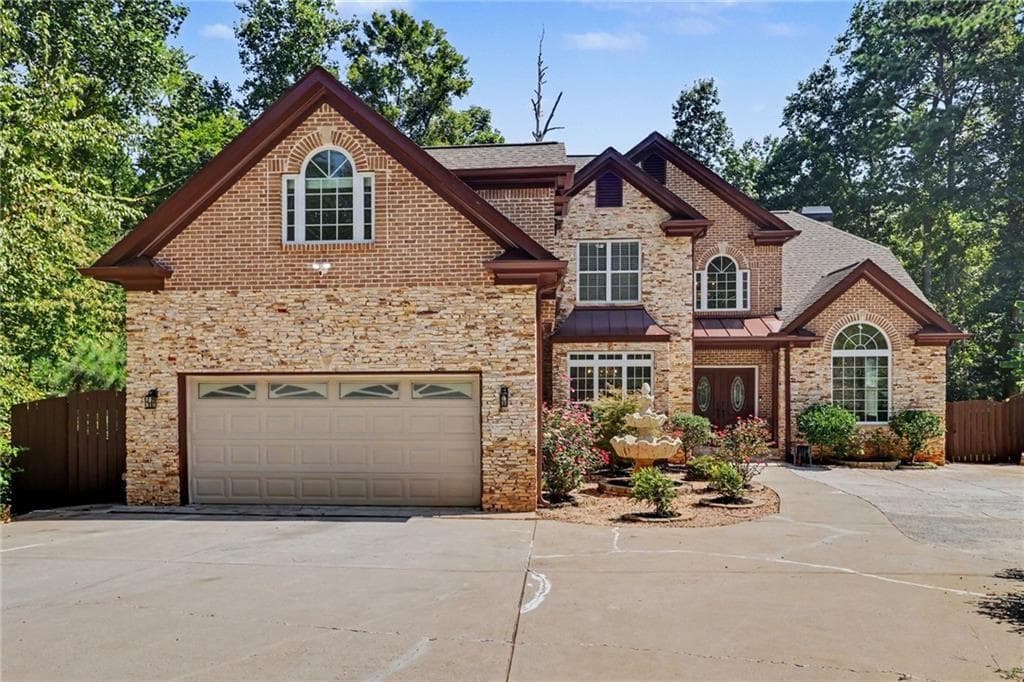 6 bedroom, 6 bathroom, 5,950 sq ft single family residence for sale at 760 Links View Drive, Sugar Hill, GA 30518 — photo 2
