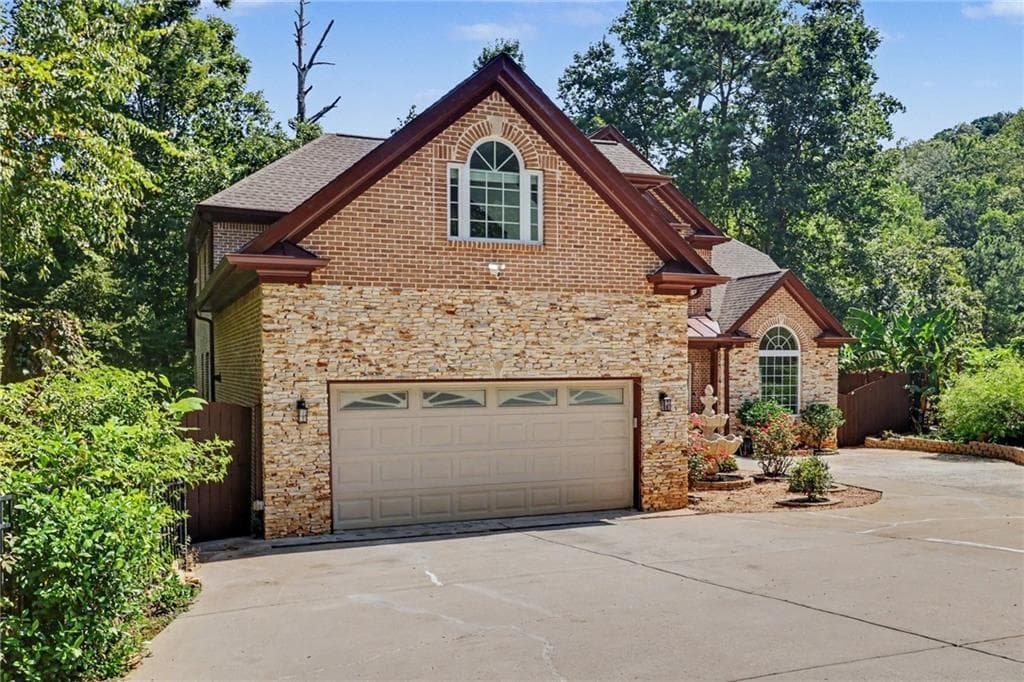 6 bedroom, 6 bathroom, 5,950 sq ft single family residence for sale at 760 Links View Drive, Sugar Hill, GA 30518 — photo 3