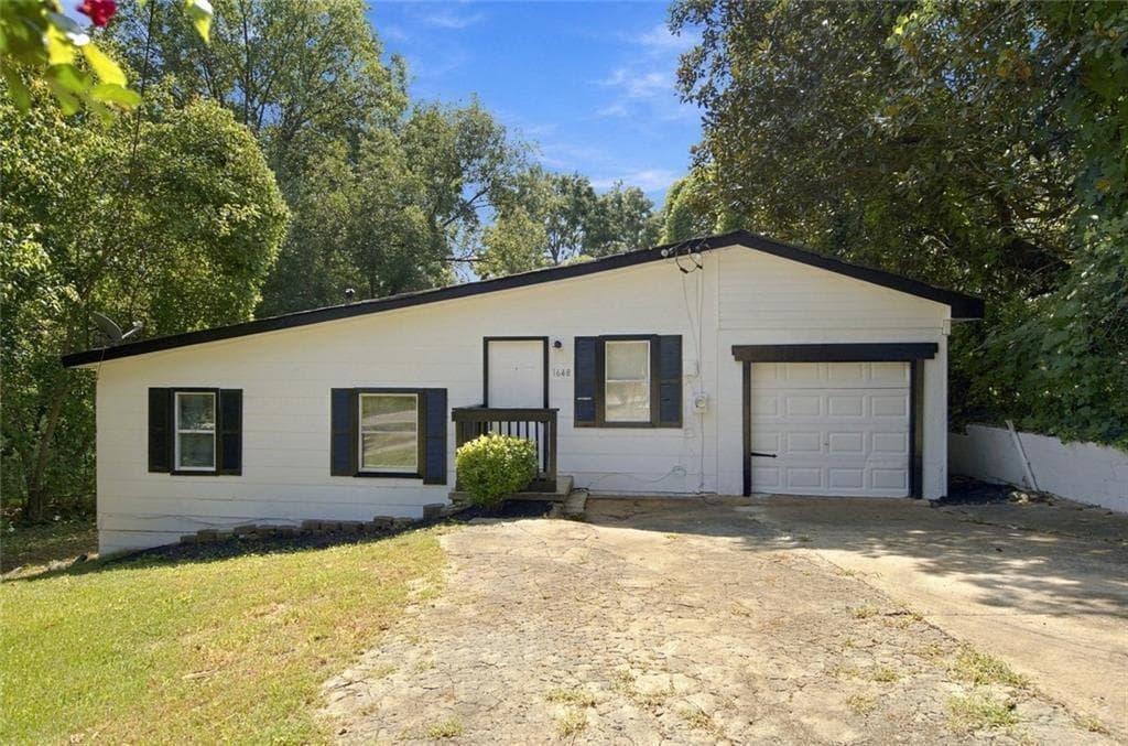 3 bedroom, 2 bathroom, 1,100 sq ft single family residence for sale at 1648 Mary George Avenue, Atlanta, GA 30318 — photo 1 of 22