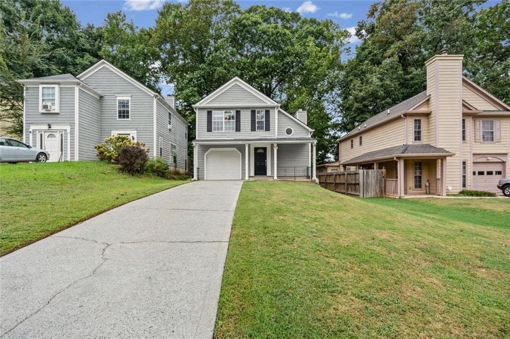 3 bedroom, 3 bathroom, 1,752 sq ft single family residence for sale at 1180 Holly Circle, Lawrenceville, GA 30044 — photo 2