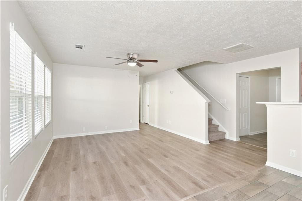 3 bedroom, 3 bathroom, 1,725 sq ft single family residence for sale at 3676 Roseman Landing, Cumming, GA 30040 — photo 4