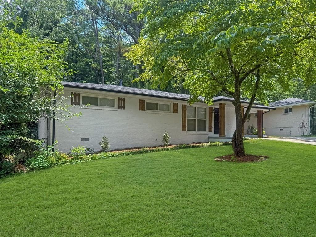 3 bedroom, 2 bathroom, 1,118 sq ft single family residence for sale at 1380 Dennis Drive, Decatur, GA 30032 — photo 2