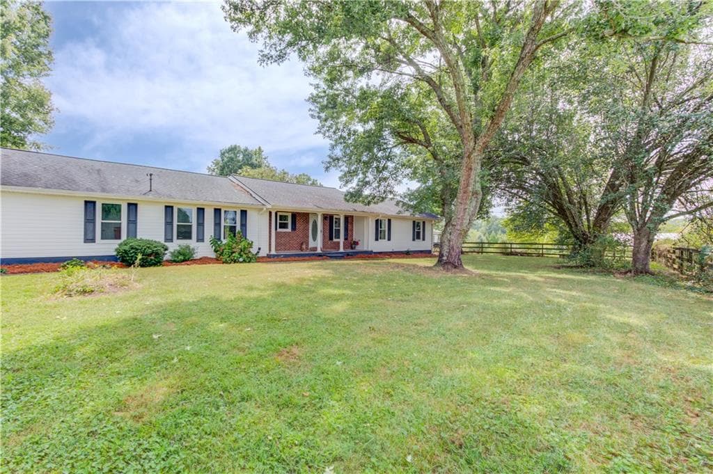 4 bedroom, 3 bathroom, 2,342 sq ft single family residence for sale at 2085 Jones Phillips Road, Dacula, GA 30019 — photo 2