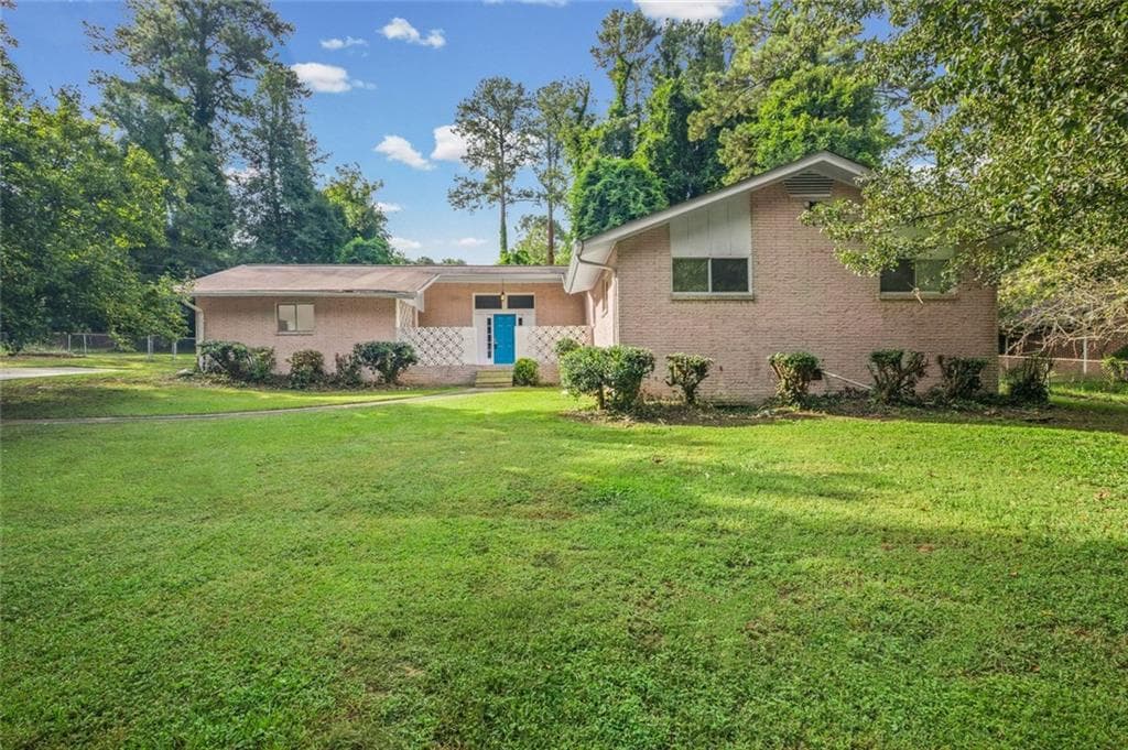 3 bedroom, 2 bathroom, 1,644 sq ft single family residence for sale at 1616 Bethsaida Road, Riverdale, GA 30296 — photo 2