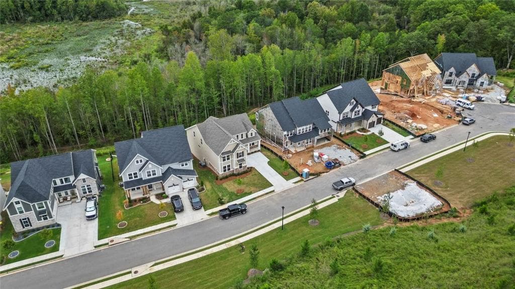 4 bedroom, 3 bathroom, 3,167 sq ft single family residence for sale at 229 Kerr Drive, Hoschton, GA 30548 — photo 2