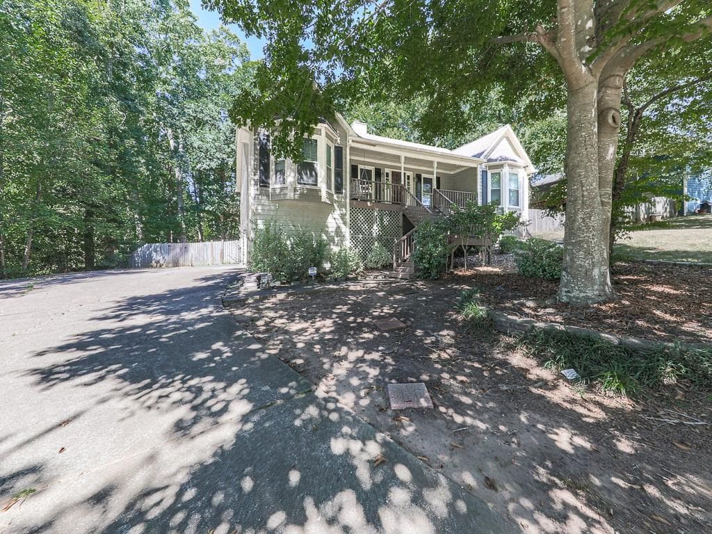 4 bedroom, 2 bathroom, 2,016 sq ft single family residence for sale at 4440 Whiteleaf Way, Canton, GA 30115 — photo 2