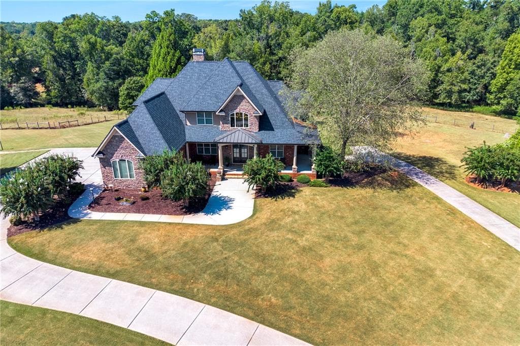 5 bedroom, 6 bathroom, 7,768 sq ft single family residence for sale at 775 Jeff Cook Road, Mansfield, GA 30055