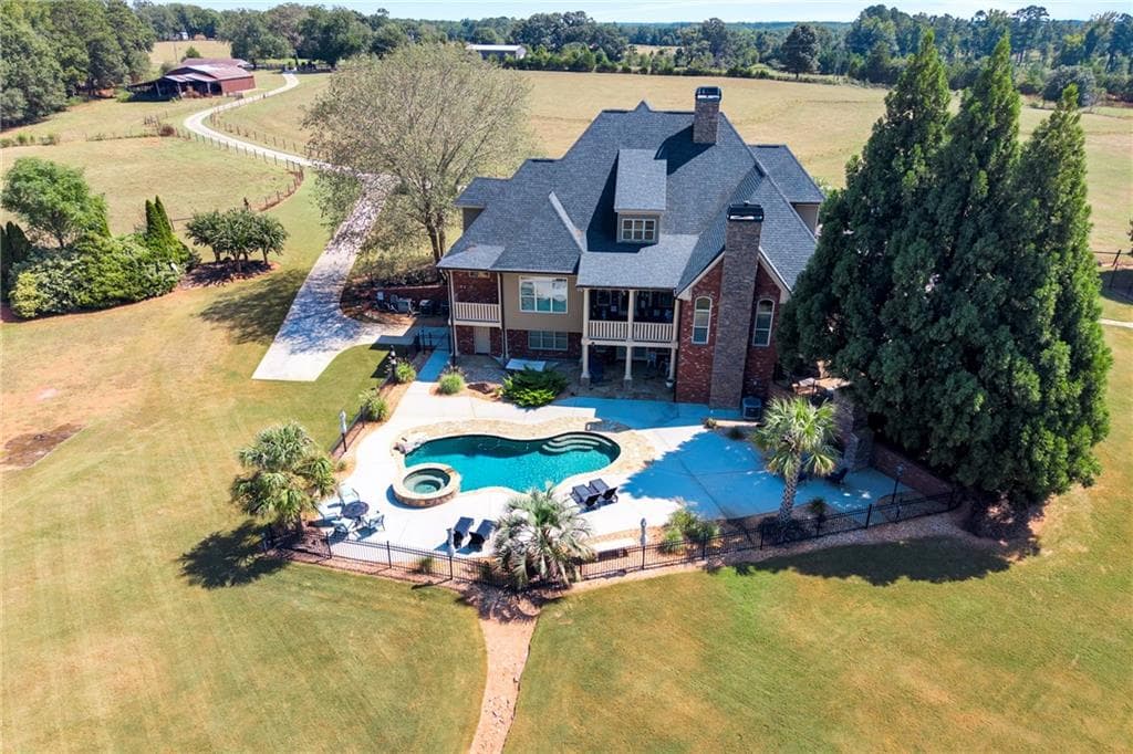 5 bedroom, 6 bathroom, 7,768 sq ft single family residence for sale at 775 Jeff Cook Road, Mansfield, GA 30055 — photo 3