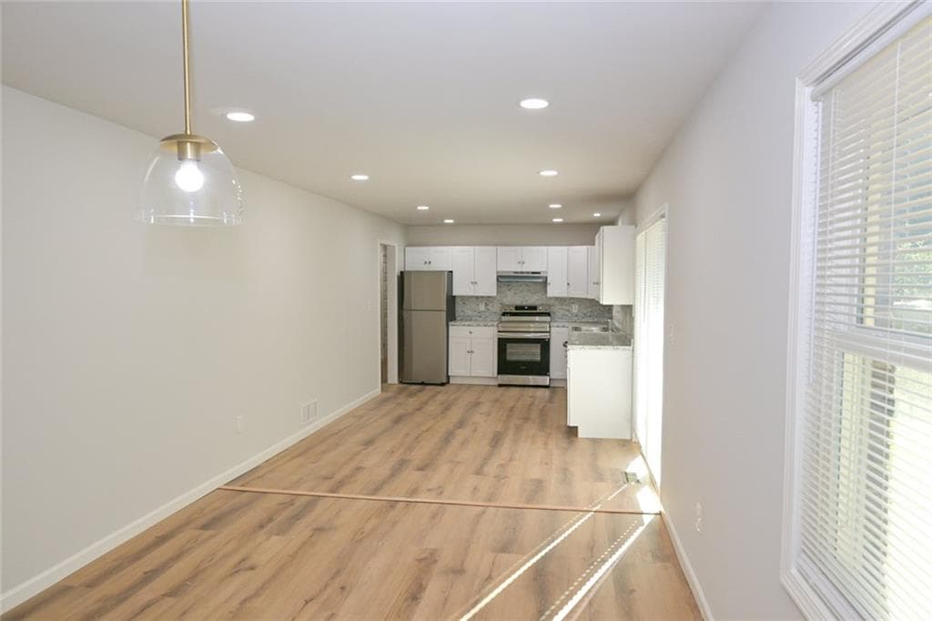 3 bedroom, 2 bathroom, 1,535 sq ft single family residence for sale at 586 E Glochester Place, Norcross, GA 30071 — photo 5