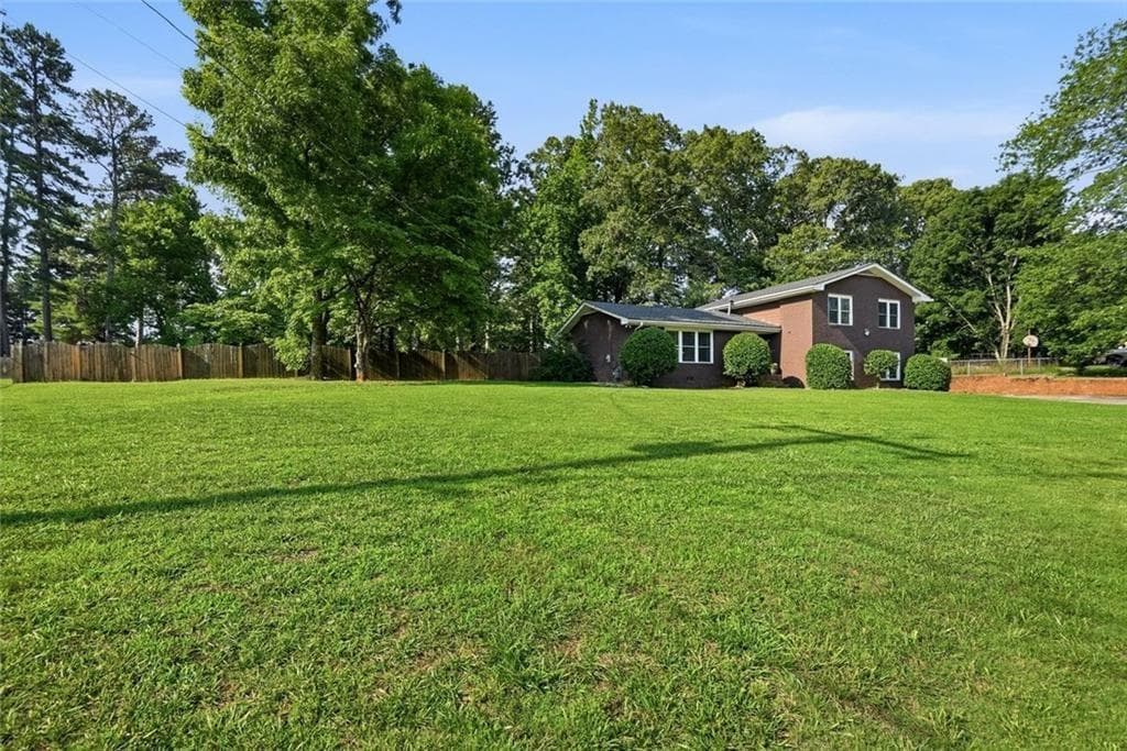 3 bedroom, 3 bathroom, 2,754 sq ft single family residence for sale at 2725 Spring Drive, Cumming, GA 30041 — photo 2