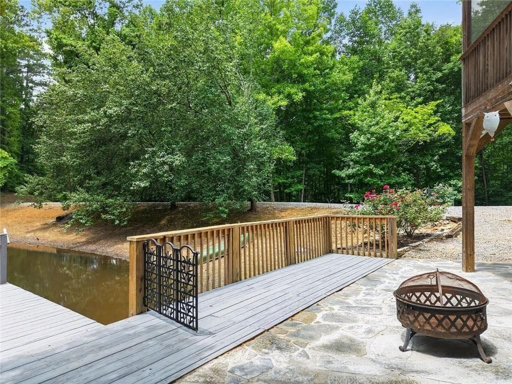 7 bedroom, 6 bathroom, 5,758 sq ft single family residence for sale at 105 Whitestone Road North, Talking Rock, GA 30175 — photo 7