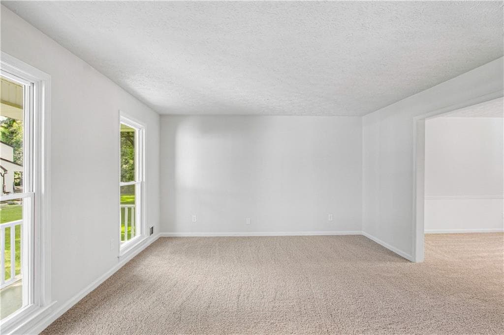 4 bedroom, 3 bathroom, 3,051 sq ft single family residence for sale at 2215 Angela Drive, Lilburn, GA 30047 — photo 3