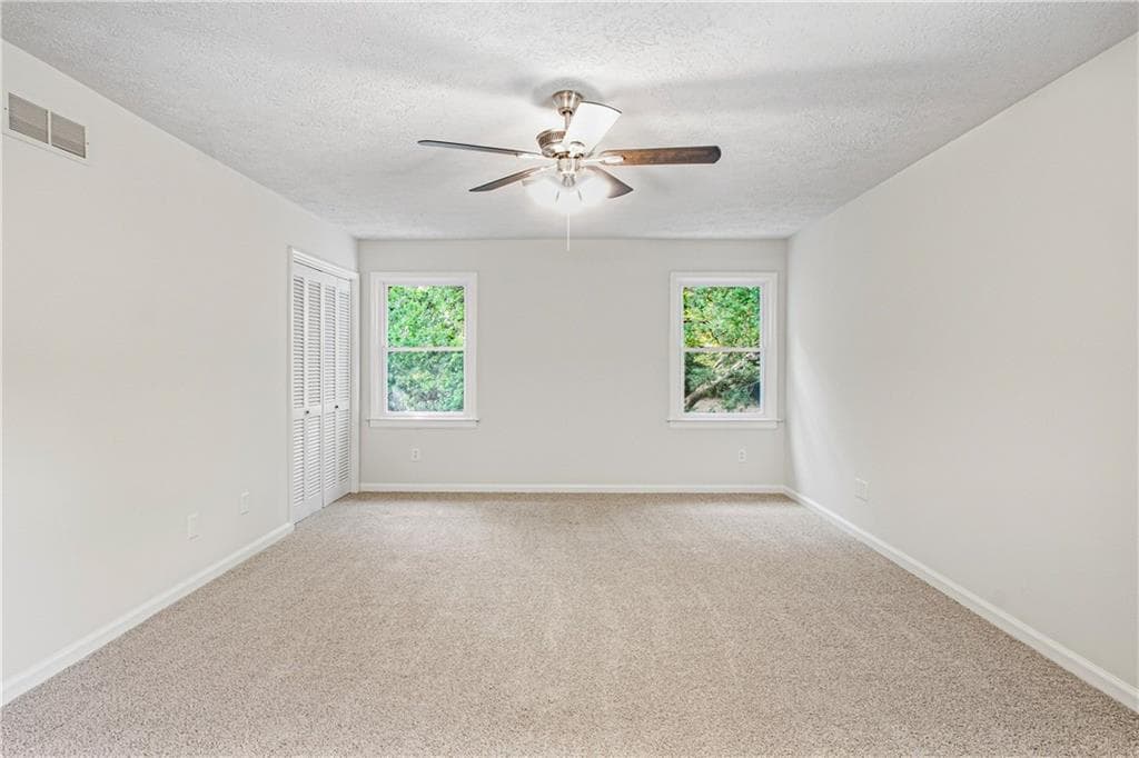 4 bedroom, 3 bathroom, 3,051 sq ft single family residence for sale at 2215 Angela Drive, Lilburn, GA 30047 — photo 4