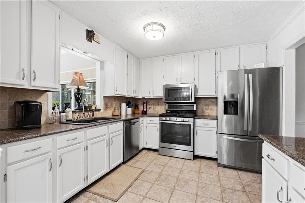 4 bedroom, 3 bathroom, 2,320 sq ft single family residence for sale at 4758 Shallow Ridge Road, Kennesaw, GA 30144 — photo 2