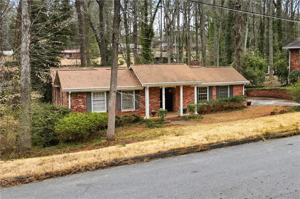 5 bedroom, 3 bathroom, 3,452 sq ft single family residence for sale at 2897 Branchwood Drive, Atlanta, GA 30344