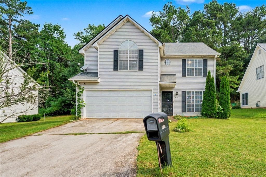 4 bedroom, 3 bathroom, 2,498 sq ft single family residence for sale at 6258 Phillips Lake Court, Lithonia, GA 30058 — photo 2