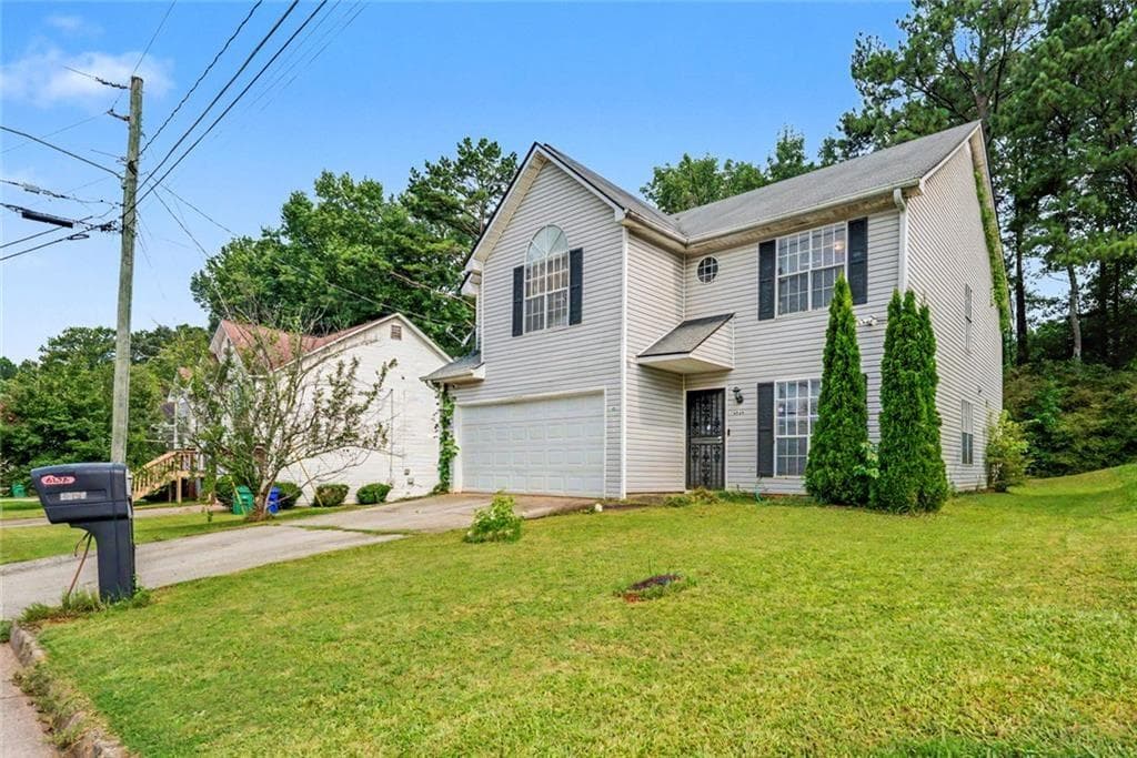 4 bedroom, 3 bathroom, 2,498 sq ft single family residence for sale at 6258 Phillips Lake Court, Lithonia, GA 30058 — photo 3