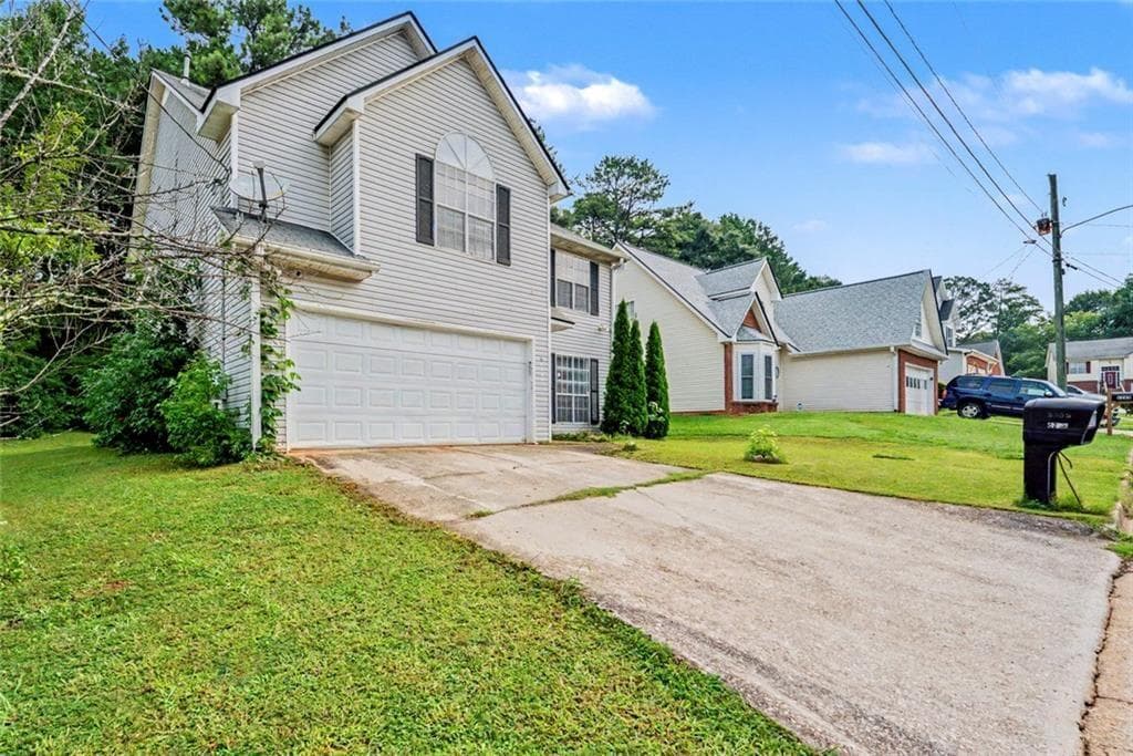 4 bedroom, 3 bathroom, 2,498 sq ft single family residence for sale at 6258 Phillips Lake Court, Lithonia, GA 30058 — photo 4