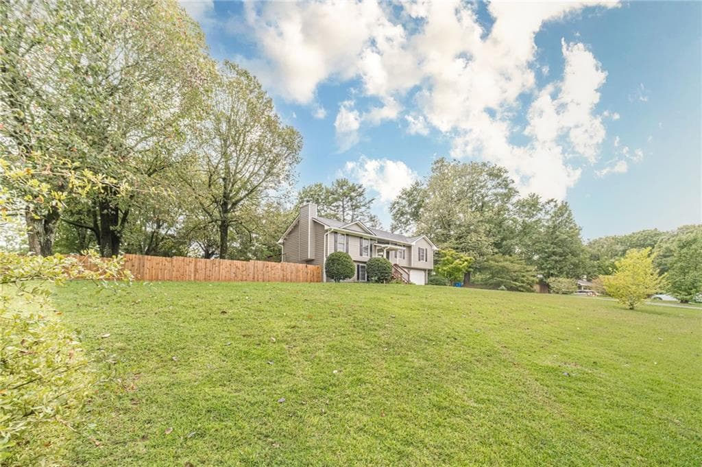 5 bedroom, 3 bathroom, 2,103 sq ft single family residence for sale at 27 Creek View Drive, Hoschton, GA 30548 — photo 6